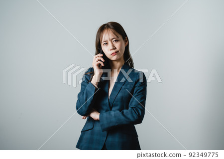 Business person woman making a phone call 92349775