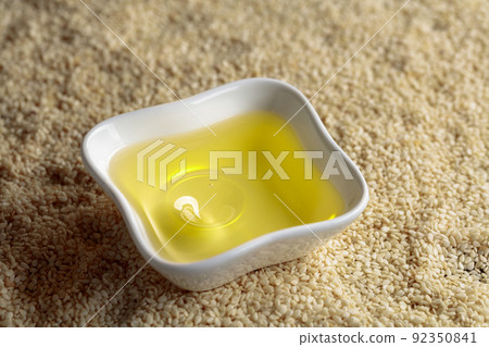 Sesame oil in small bowl. 92350841