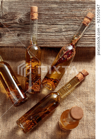 Homemade olive oil with herbs and spices. Homemade olive oil with herbs and spices. 92350847