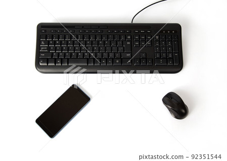 Keyboard and mouse smartphone white background 92351544