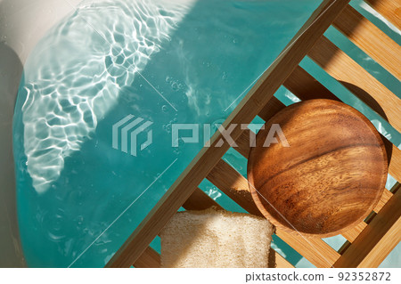 Spa decoration, relaxation preparation, natural organic products on a bathtube. 92352872