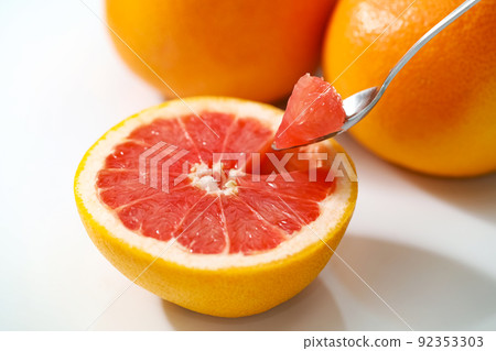 Ruby grapefruit on a white background Ruby grapefruit on a white background 92353303