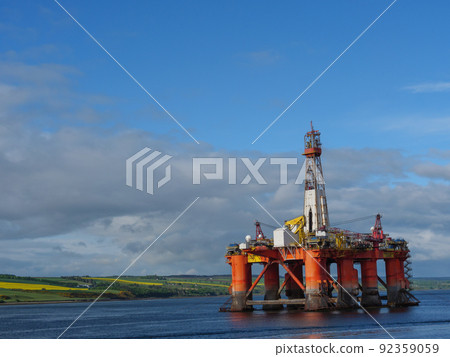 the scotish coast and a castle in the highlands 92359059