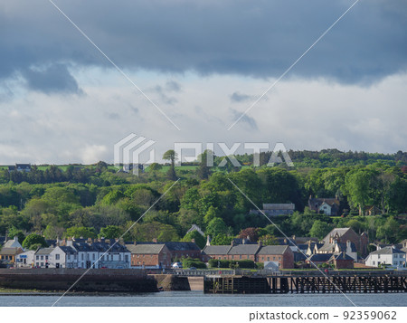the scotish coast and a castle in the highlands 92359062