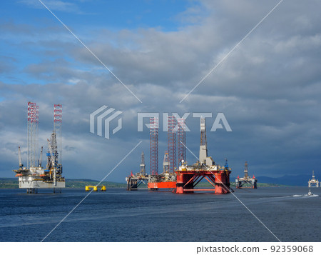 the scotish coast and a castle in the highlands 92359068