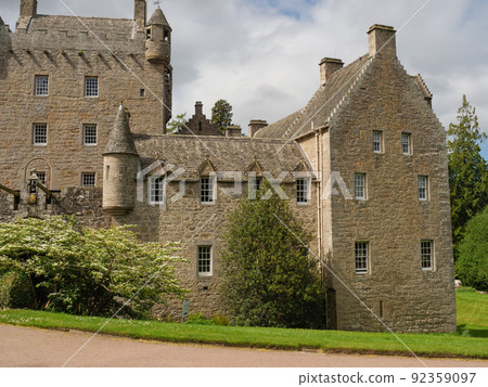 the scotish coast and a castle in the highlands 92359097