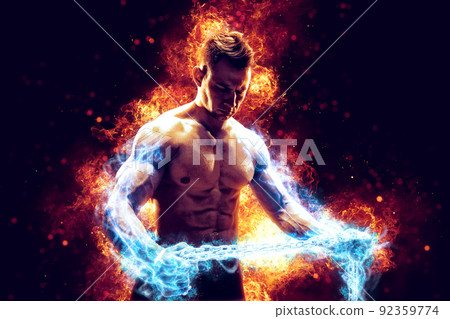 Muscular man with naked torso holding electric energy chain. Isolated on dark background with fire 92359774
