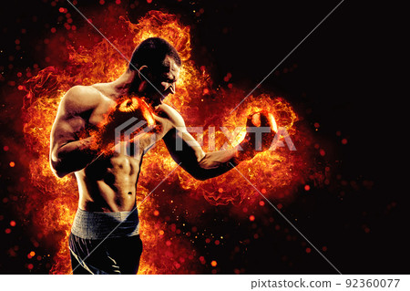 Fighter man in fire. Sport advertising. MMA boxer 92360077