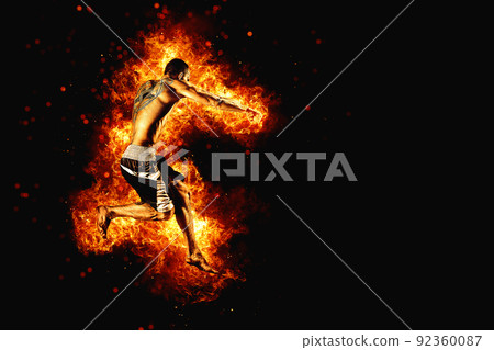 Fighter man in fire. Sport advertising. MMA boxer 92360087
