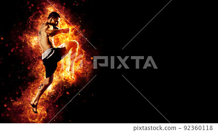 Fighter man in fire. Sport advertising. MMA boxer 92360118