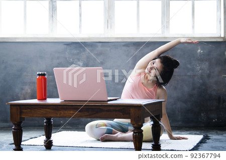 Online yoga young woman 92367794