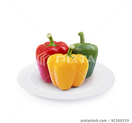 Sweet pepper on plate isolated on white background Sweet pepper on plate isolated on white background 92368559