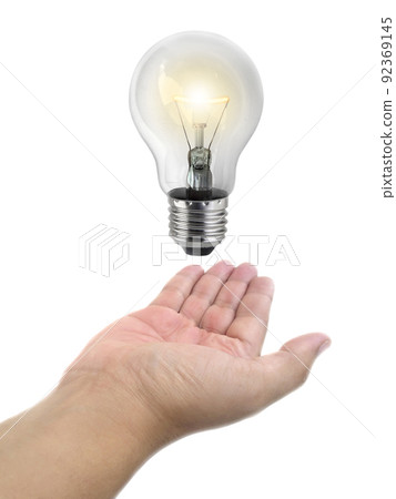 Ideas bulb light on a hand 92369145