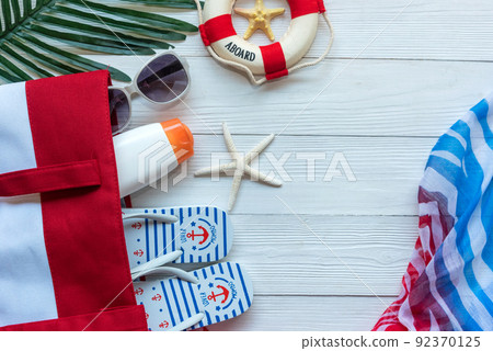 Summer Fashion woman big hat and sunblock with accessories item go to travel in the beach. 92370125