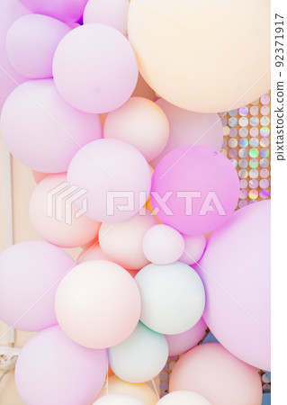 pink, beige and light green balloons.  92371917
