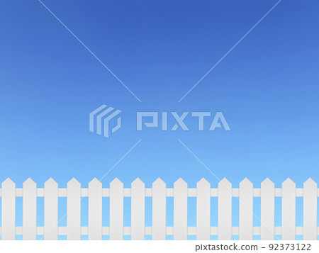 White wooden fence and on a clear blue sky background 92373122