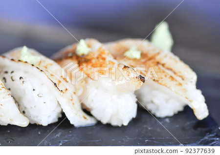 sushi or engawa sushi or fish sushi, rice topped with engawa or fish rolls sushi or engawa sushi or fish sushi, rice topped with engawa or fish rolls 92377639