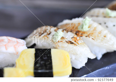 sushi or engawa sushi or fish sushi, rice topped with engawa or fish rolls 92377649