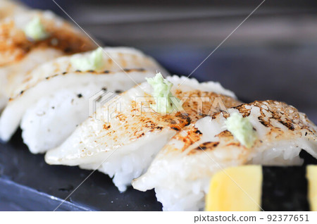 sushi or engawa sushi or fish sushi, rice topped with engawa or fish rolls sushi or engawa sushi or fish sushi, rice topped with engawa or fish rolls 92377651