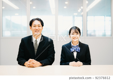 Men and women in suits (appraisers / pawn shops) Men and women in suits (appraisers / pawn shops) 92378812