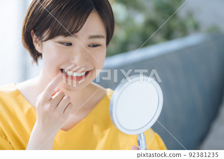Female dental care smile 92381235