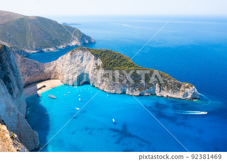View of Navagio beach, Zakynthos Island, Greece. Vacation time. Aerial landscape from drone. View of Navagio beach, Zakynthos Island, Greece. Vacation time. Aerial landscape from drone. 92381469