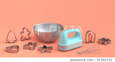 Metal bowl with electric mixer and cookie cutters on coral background 92382532