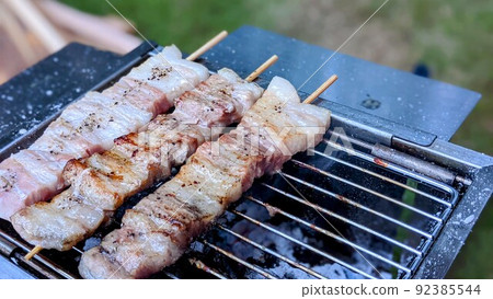 Bake slowly over charcoal 92385544