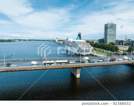 Beautiful cruise ship docked in Riga, Latvia near the old town and the bridge. 92386032