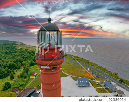 Beautiful limestone cliff on Pakri peninsula, Estonia with the historic lighthouses. Beautiful limestone cliff on Pakri peninsula, Estonia with the historic lighthouses. 92386054