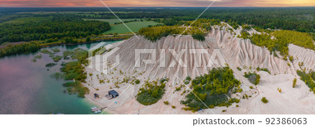 Abandoned quarry for extraction of limestone. Beautiful nature, attraction in Estonia. Abandoned quarry for extraction of limestone. Beautiful nature, attraction in Estonia. 92386063