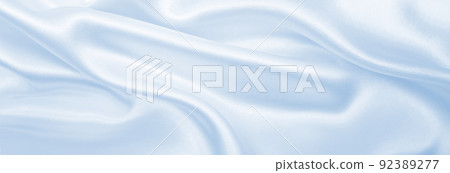 Smooth elegant blue silk or satin luxury cloth texture as abstract background. Luxurious background design Smooth elegant blue silk or satin luxury cloth texture as abstract background. Luxurious background design 92389277