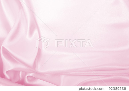 Smooth elegant pink silk or satin texture as wedding background. Luxurious background design Smooth elegant pink silk or satin texture as wedding background. Luxurious background design 92389286