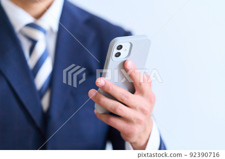 Men's fashion young businessman in a suit Men's fashion young businessman in a suit 92390716