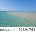 Blue sky, white sand, emerald green sea 92391762