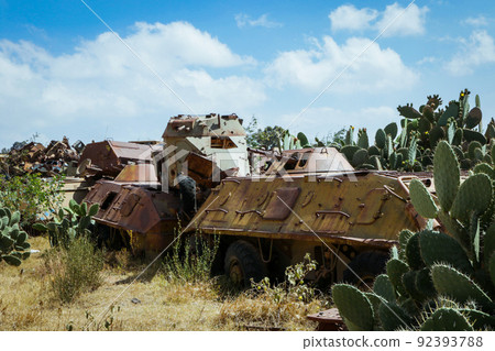Destroyed War Machines and Tanks rounded by Cactuses on the Tank Graveyard in Asmara, Eritrea Destroyed War Machines and Tanks rounded by Cactuses on the Tank Graveyard in Asmara, Eritrea 92393788
