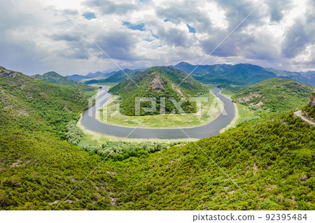 Canyon of Rijeka Crnojevica river near the Skadar lake coast. One of the most famous views of Montenegro. River makes a turn between the mountains and flows backward Portrait of a disgruntled girl 92395484