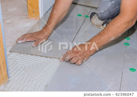 Tile levelling system with plastic clips and wedges 92396847