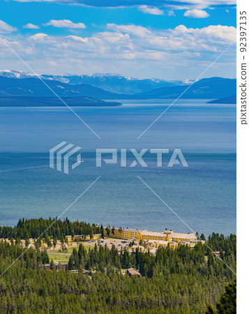 Sunny beautiful high angle view of the Yellowstone Lake landscape and Lake Yellowstone Hotel in Yellowstone National Park Sunny beautiful high angle view of the Yellowstone Lake landscape and Lake Yellowstone Hotel in Yellowstone National Park 92397135