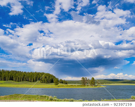 Sunny beautiful Yellowstone River landscape in Yellowstone National Park Sunny beautiful Yellowstone River landscape in Yellowstone National Park 92397159