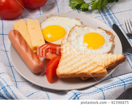 English breakfast with fried eggs. concept English breakfast with fried eggs. concept 92398875
