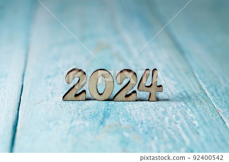 The year 2024 in large numbers on a blue background. Elements for calendar design. The year 2024 in large numbers on a blue background. Elements for calendar design. 92400542