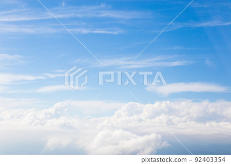 Summer clouds seen from an airplane 92403354