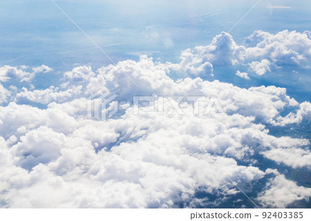 Summer clouds seen from an airplane 92403385