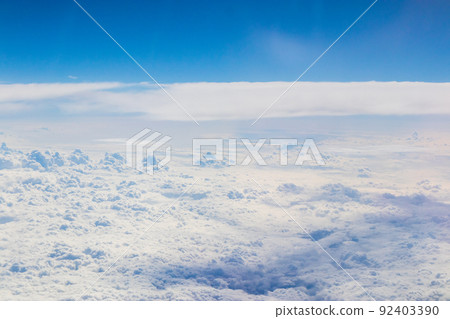Summer clouds seen from an airplane Summer clouds seen from an airplane 92403390