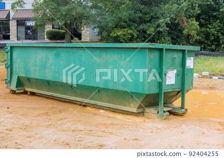 Using a metal container trash dumpster for recycling garbage is considered a good idea 92404255