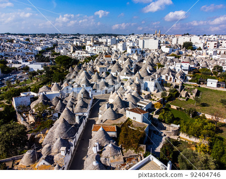 The famous Trulli houses of Alberobello - a popular town in Italy 92404746