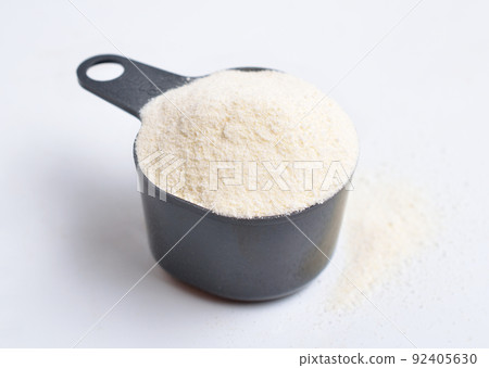 Guar gum, also called guaran, is a galactomannan polysaccharide extracted from guar beans. On white background. Guar gum, also called guaran, is a galactomannan polysaccharide extracted from guar beans. On white background. 92405630