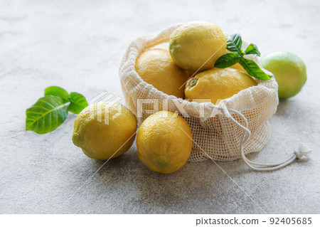 Eco-friendly bag with ripe  lemons 92405685