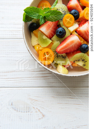 Healthy fresh fruit salad in a bowl Healthy fresh fruit salad in a bowl 92405694